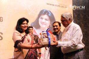 MP Aparajita sarangi receiving gift from Chairman of Regional College of Management Dr Prabir Pal