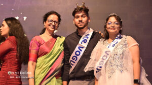 Students getting awarded as Mr and Miss freshers