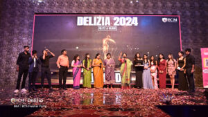 Students and teachers at a stage of college fresers party.