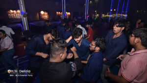 Students dancing at a college freshers party.