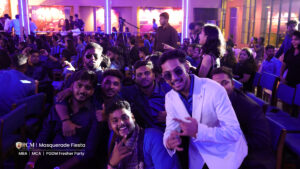 Student posing for a photograph for freshers party.