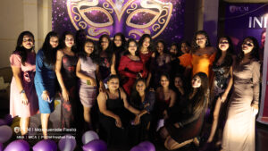 Group of girls posing for a photograph in college freshers party