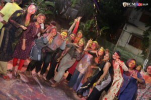 Students dancing and enjoying Holi festivities at RCM.
