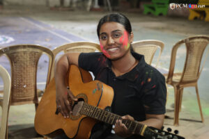 Happy faces covered in bright Holi colors at RCM campus.