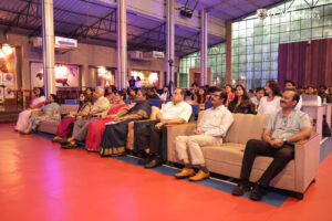 Audience participating in a Q&A session at Lumora