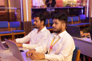 Attendees listening to a lecture on gender equality in art at Lumora