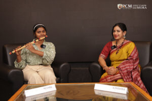 Performance artist preparing for her show at Lumora event