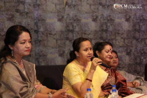 Woman artist discussing her leadership journey at Lumora