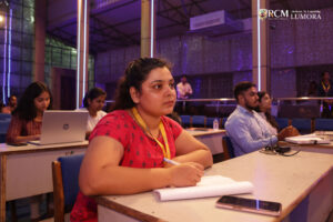 Guests viewing a powerful art installation created by women at Lumora