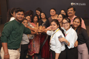 Group of attendees celebrating the success of the Women in Media Series event
