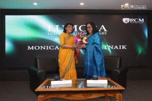 Dr. Monica Nayyar Patnaik, Managing Director of Sambad, receiving an award at the Lumora event at RCM for her outstanding contributions to the media industry.