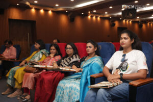 Attendees listening attentively during the event.