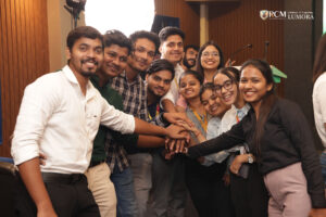 Attendees watching a documentary highlighting women in media during the event