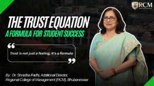 Dr. Shradha Padhi, Additional Director at RCM Bhubaneswar, standing beside a quote on trust and student success from her blog post titled "The Trust Equation".