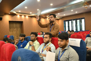 Participants engaged in a high-stakes virtual trading simulation during the BID TO WIN event at RCM.