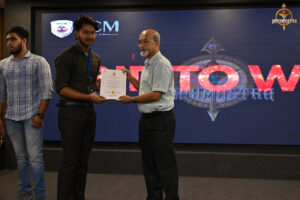 Prize distribution ceremony of BID TO WIN at RCM, awarding top performers in the stock market simulation event.