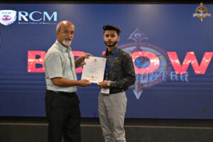 Prize distribution ceremony for BID TO WIN participants at RCM, celebrating strategic excellence in stock market simulation.