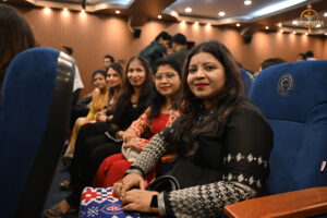 Bid to Win participants enjoying a light-hearted moment during the high-stakes trading simulation at RCM.