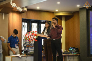 Participants strategizing during the live stock market simulation at BID TO WIN, Brahmastra 2025.