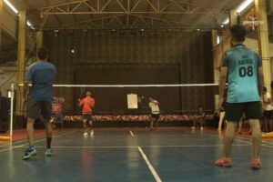Badminton mixed doubles match action under Kurukshetra event of Brahmastra 2025 college fest at RCM Bhubaneswar