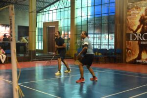 Intense badminton match during Brahmastra 2025 at RCM Bhubaneswar