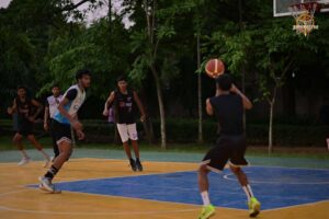 Basketball players in action during Brahmastra 2025 sports event at RCM Bhubaneswar