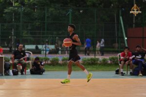 Players in action during an intense basketball match at Brahmastra 2025, RCM Bhubaneswar