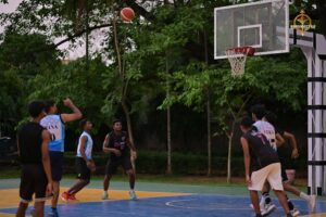 Basketball players in action during Brahmastra 2025 at Regional College of Management, Bhubaneswar