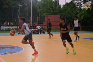 Players in action during a competitive basketball match at Brahmastra 2025, Regional College of Management, Bhubaneswar.