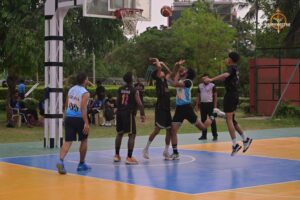 Players competing intensely during the basketball match at Brahmastra 2025, Regional College of Management (RCM), Bhubaneswar