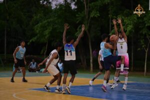 Brahmastra 2025 basketball match intense gameplay with players jumping for the ball on court
