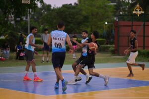 Player making a slam dunk during the Basketball Fury match at Brahmastra 2025, RCM Bhubaneswar