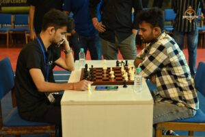 "Students playing chess during Kurukshetra event at Brahmastra 2025 college fest, RCM Bhubaneswar"