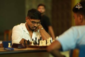 Students participating in a chess match under Kurukshetra at Brahmastra 2025 college fest, RCM Bhubaneswar