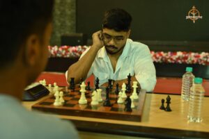 Students playing intense chess match during Kurukshetra event at Brahmastra 2025 college fest, RCM Bhubaneswar