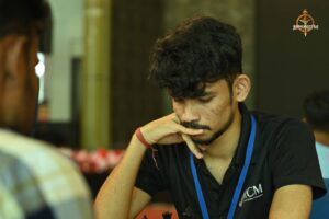 Students competing in a chess match during Kurukshetra at Brahmastra 2025 college fest at RCM Bhubaneswar