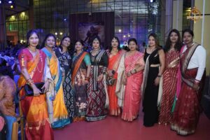 Dance event participants with mentors at Brahmastra, top college festival in India, celebrating teamwork.