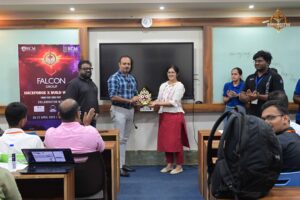 RGBS Director presenting a gift to the judge during Brahmastra, India’s top college festival and hackathon event.