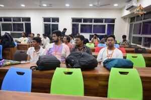 Students gathered in the hall during HackForge hackathon at the Brahmastra college festival in top management college.