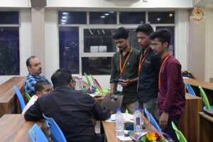 Student participant presenting idea to judges during Build With AI hackathon at Brahmastra college festival.