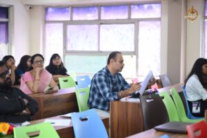 Faculty observing student participants during Build With AI hackathon at Brahmastra, India’s best college festival for innovation.