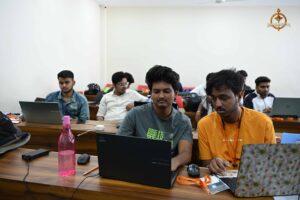 Students engaged in system-based brainstorming during Build With AI HackForge at Brahmastra college festival event.