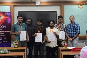 Students holding certificates with judge at Brahmastra, India's best college festival by top management college RCM.