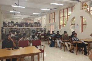 Participants with laptops competing in HackForge hackathon at Brahmastra, India's top college festival for innovation.