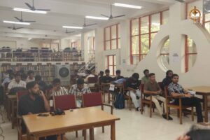 Students at top management college participating in Build With AI hackathon during Brahmastra college festival 2025.