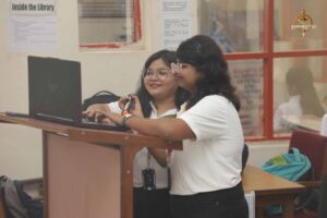 Students presenting on stage during Build With AI at Brahmastra, top college festival in India.