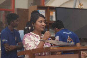 Guest addresses audience during Build With AI hackathon at Brahmastra, best college festival in India.