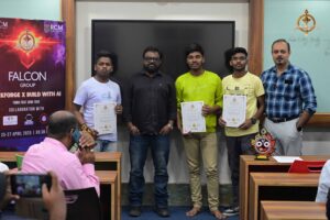 Students awarded certificates with judges on stage during Brahmastra, India’s top college tech festival event.
