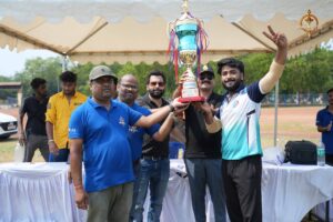 Winning cricket team holding trophy at Brahmastra 2025 Ranbhoomi event