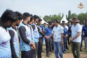 Sponsor representative shaking hands with players at Brahmastra 2025 event